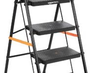 amazon basics Clamber - Foldable Step Ladder, Safety-Clutch Lock, Ribbed Steps, Knee Guard, Non-Marring PVC Shoes, 4 Steps (Steel, Black & Orange)