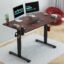 JIN OFFICE Octave Height Adjustable Desk Electric | Sit Stand Table, 80 Kg Wt. Cap, 2 Year Warranty| Standing Desk with Memory Preset, Cup Holder| Stability Crossbar| Brown 1200*750mm/25mm Thick Top