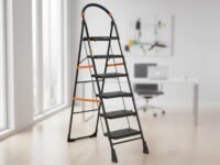 Amazon Basics Clamber - Foldable Step Ladder, Safety-Clutch Lock, Ribbed Steps, Knee Guard, Non-Marring PVC Shoes, 6 Steps (Steel, Black & Orange)