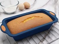 To encounter 8 in 1 Silicone Baking Set - 6 Cake Molds - 2 Silicone Baking Mat, Nonstick Cookie Sheet, Cake Muffin Bread Pan with Grips and Metal Reinforced Frame More Strength, Navy Blue